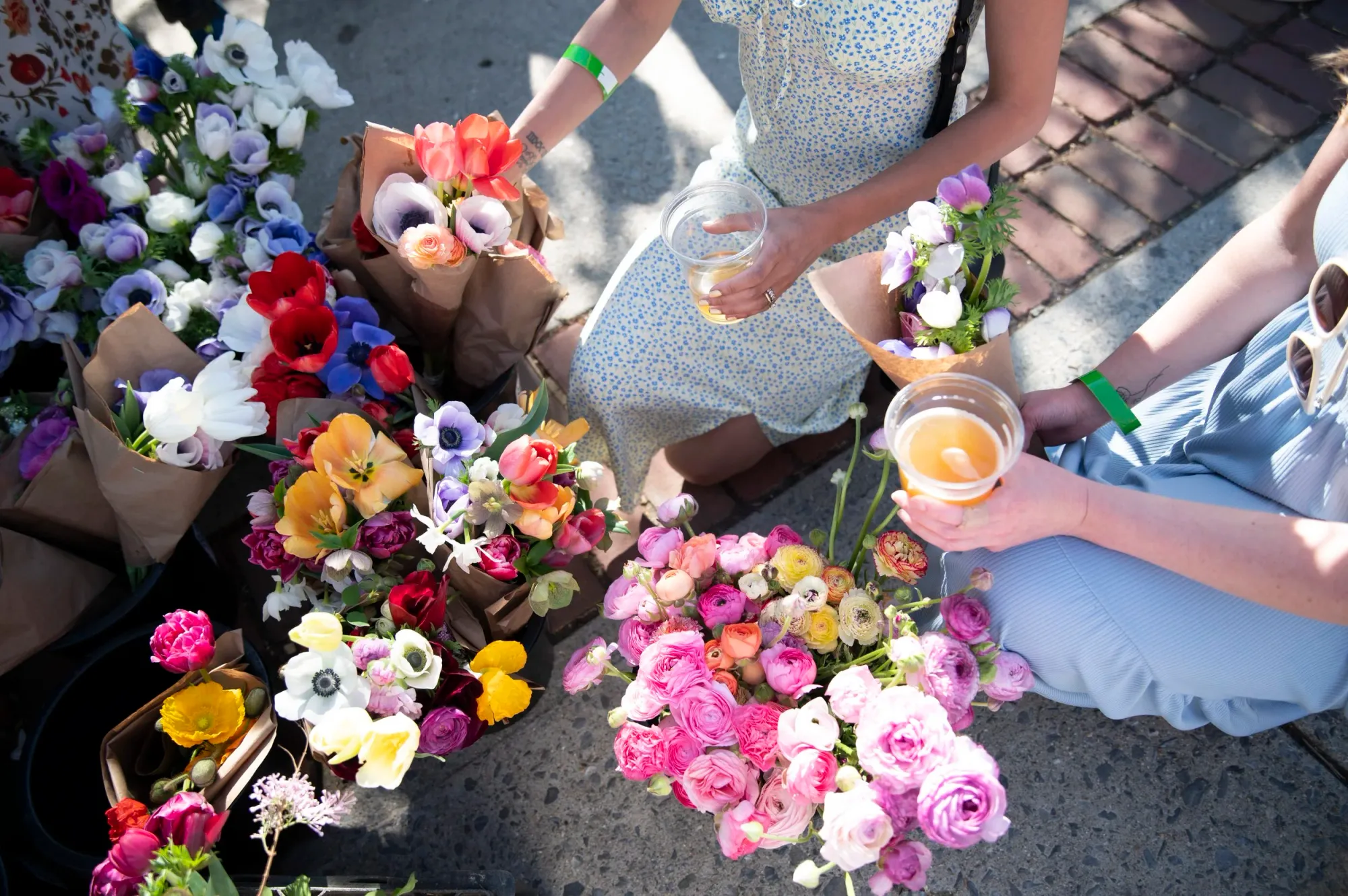 Fresh flowers and artisan vendor booths at Blooms & Brews