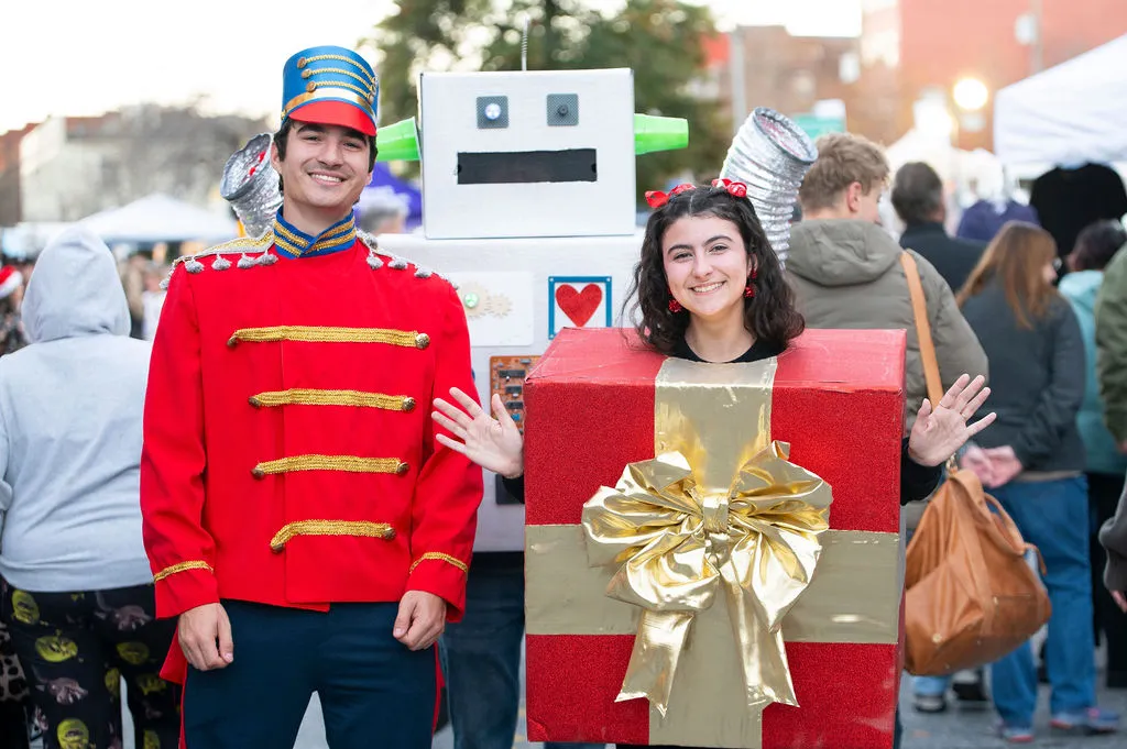 Costumed characters greeting the crowd at the Bright Nights Block Party